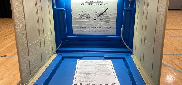 Voting booth and ballot for ISD 197 election.