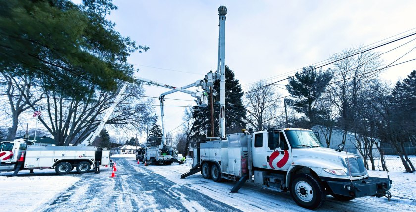 Xcel Energy trucks working on power lines (photo by Carlo James LaManna).